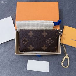 DRAGONNE KEY HOLDER Keychains Accessories Designer wallet Floral Canvas Keychain Car Key Chain Ring Charm Pochette Accessoires essential Tag Bag Stamping Stamp 02